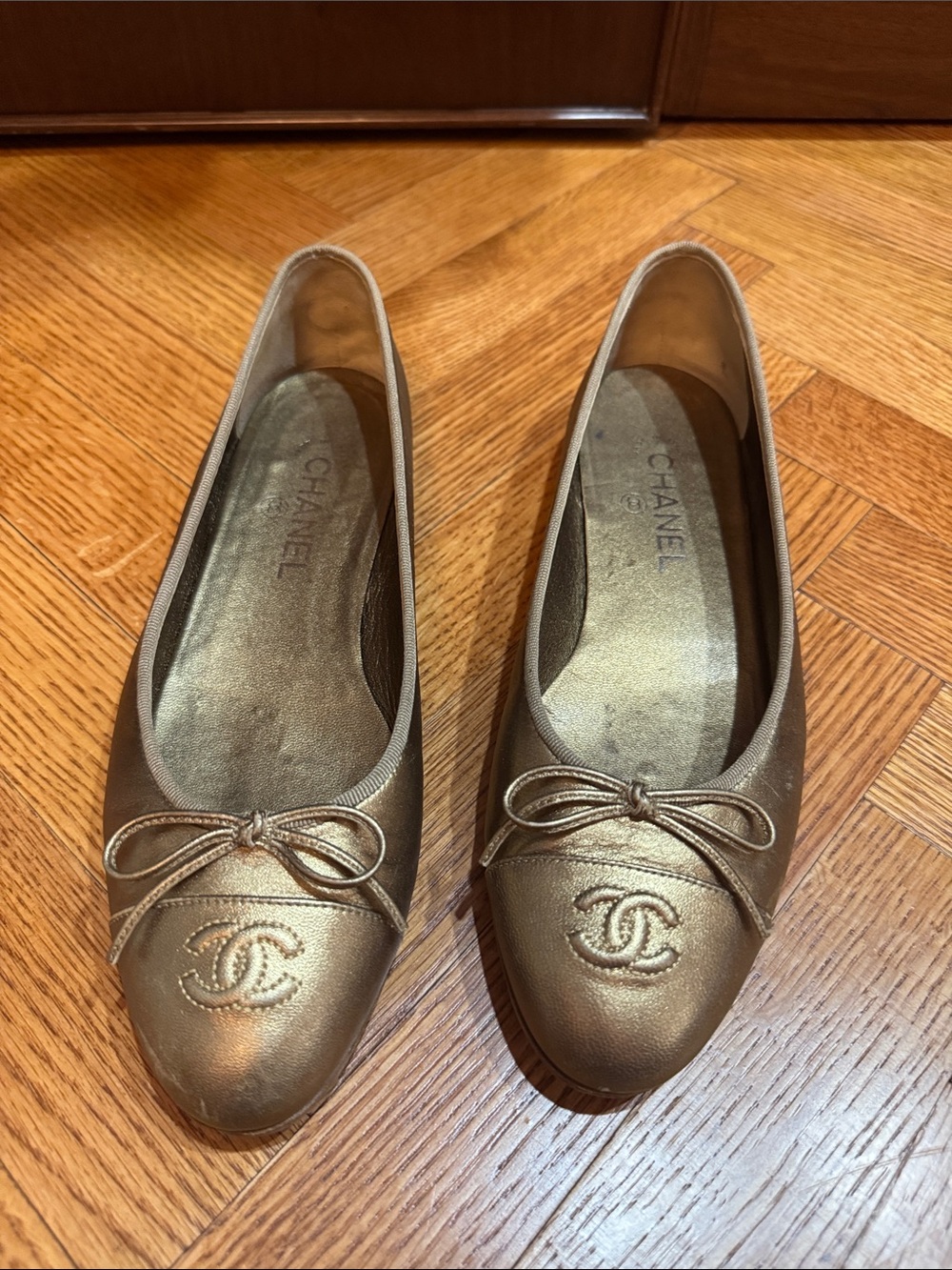 CHANEL Metallic Gold Leather Ballerina Flats with CC Emblem